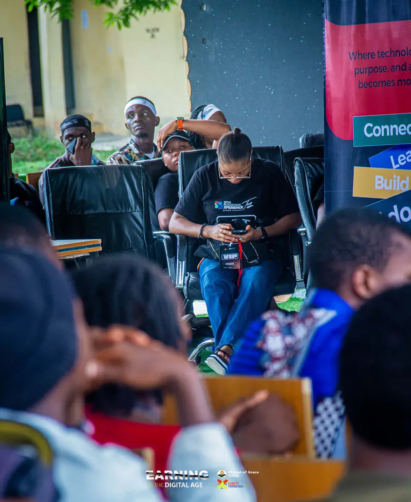 An attendee listening during an EITDA session