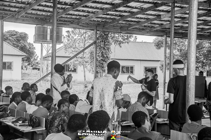 An EITDA facilitator speaking with participants in a classroom